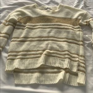 White and gold sweater